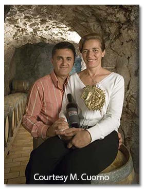 Marisa and Andrea in their wine cellar