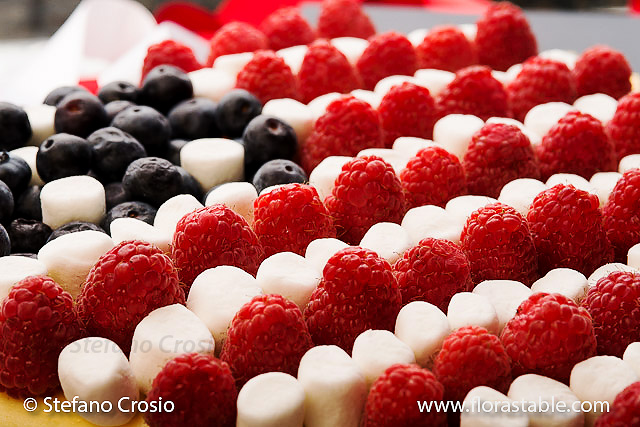Patriotic cheesecake with raspberries, blueberries and mini marshmallows